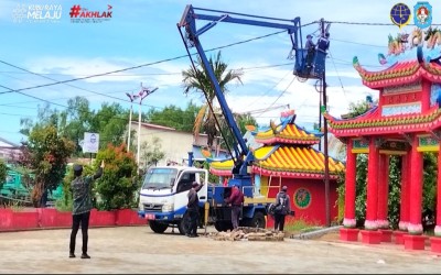 Perbaikan PJU di Pal IX dan Pemasangan PJU di Vihara Hieng Thian Siang Ti, Kecamatan Sungai Kakap